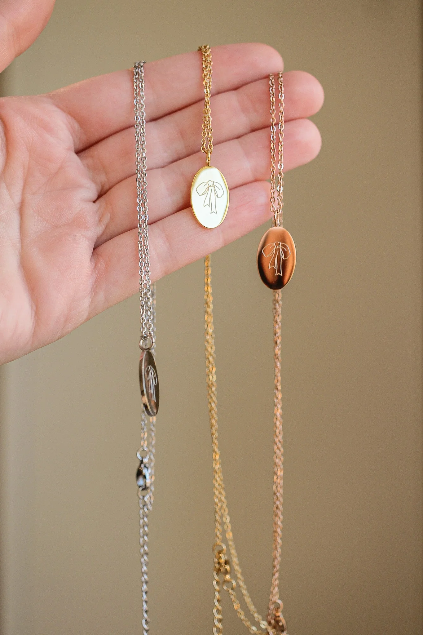 Bow Pendant Necklace in Gold - Image 11